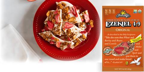 White Chocolate Strawberry Almond Granola Bark a box of cereal and a bowl of white chocolate bark with berries