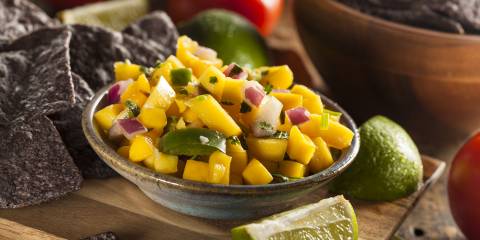 A bowl of mango chipotle salsa.
