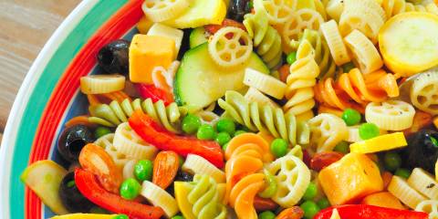 Pasta Salad with Grilled Summer Vegetables a bowl of pasta tossed with summer veggies