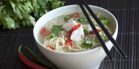 Asian Chicken Noodle Soup Bowl of asian chicken noodle soups with chopsticks.