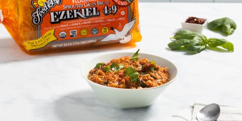Sprouted Grain Tuscan Tomato and Bread Soup a bowl of soup and a loaf of bread