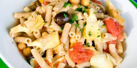 Pasta with Garbanzos, Olives and Artichokes a plate of penne with olives and artichokes