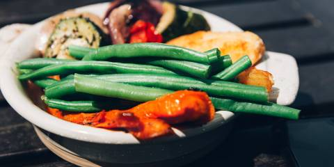 a bowl of parsnips and green beans