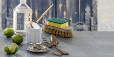 Eco friendly cleaning items with a rustic background.