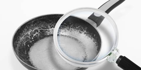 a non-stick pan under a magnifying glass