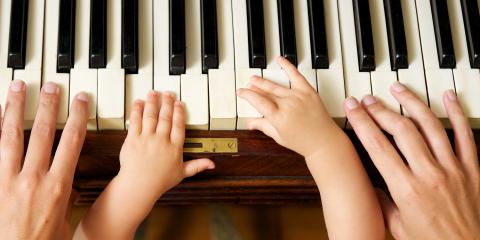 Baby playing music