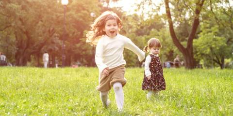 Summer Help:  Applying Homeopathy Young girls running and playing in a sunny field
