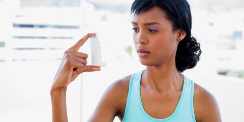 Vitamin D May Curb Asthma Attacks A woman wondering about her asthma inhaler