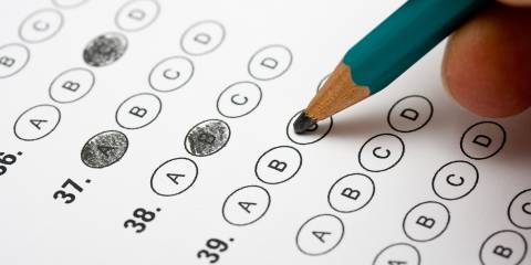 someone taking a multiple-choice quiz