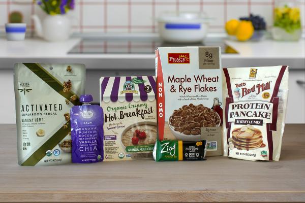 healthy cereals, pancake and waffle mix, a nutrition bar, and a smoothie