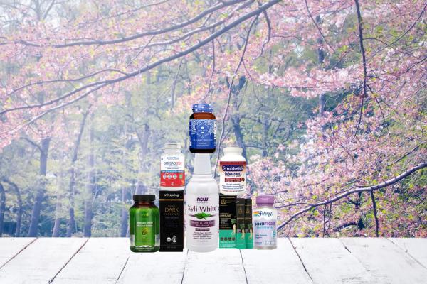 a collection of all-natural immunity supplements, body care products, and a bar of chocolate