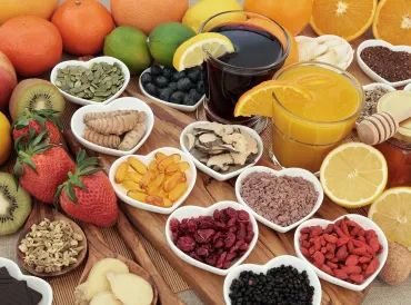 Superfoods for immunity collected in separate heart-shaped bowls.